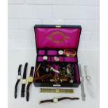 A black leather jewellery box containing a large selection of ladys and gents wristwatches (a lot)