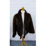 Lady's vintage brown fur jacket having bracelet length sleeves and  with Dominion Fur Company