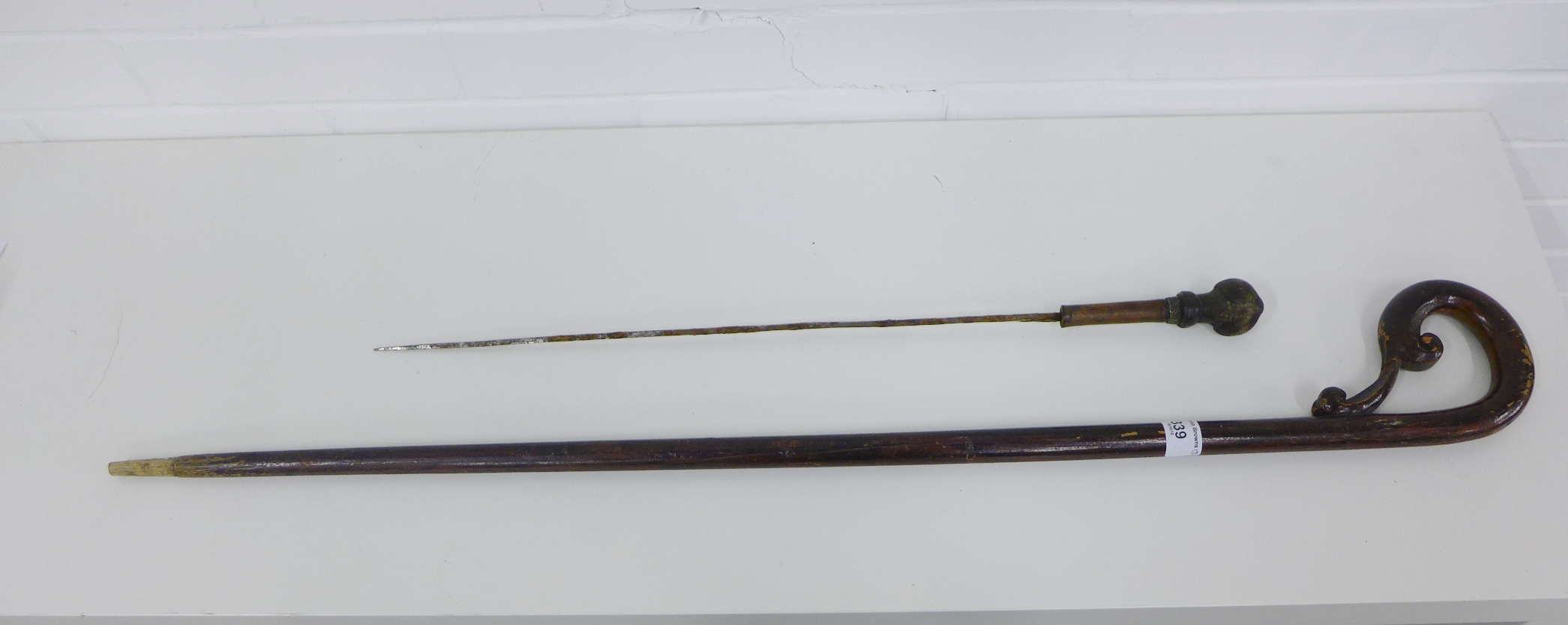 A 19th century stick sword (stick lacking) together with a mahogany stick