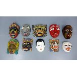 A large collection of world face masks (15)