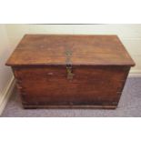 A large seaman's chest, possibly elm, iron banded corners and original lock, the interior with