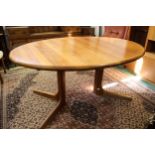 A Benny Linden Danish oval teak dining table, with two extra leaves, 164 x 114 x 74cm unextended,