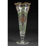 A Continental engraved and enamelled glass vase of trumpet form, decorated with pink flowers and
