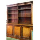 A Georgian walnut bookcase with ebony detailing