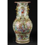 A Chinese porcelain Canton decorated baluster vase, decorated with reserves of figures in