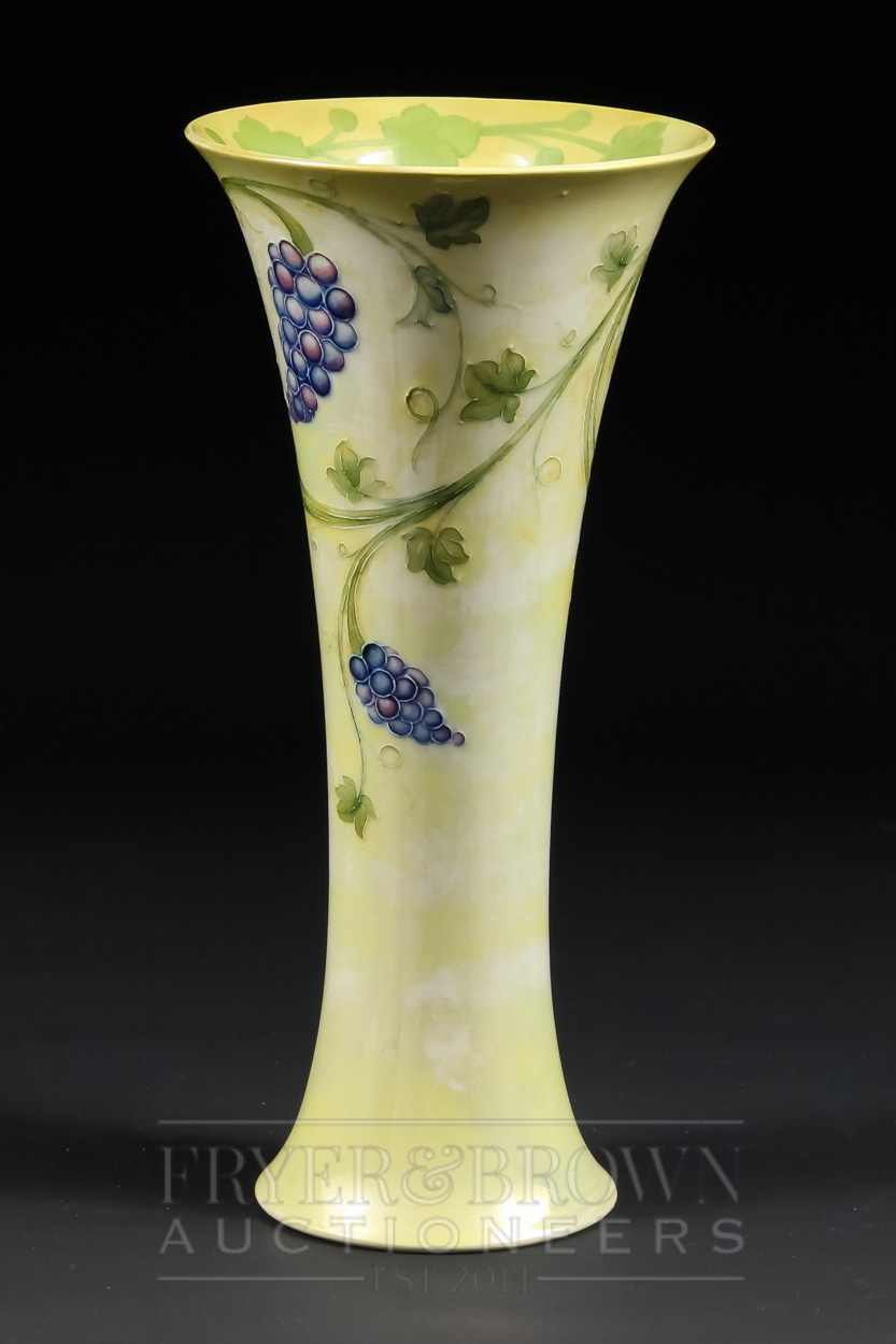 A rare Moorcroft lustre vase of trumpet form, the pale yellow lustre ground decorated with grapes - Image 3 of 6