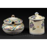 Two Honiton Pottery preserve pots & cover, one of cylindrical form decorated with blackcurrants