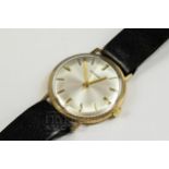 A vintage Garrard & Co. gold presentation wristwatch, presented by EMI to W.H. Rouse, 1973