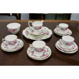 A Crown Staffordshire part tea service, 'Irish Rose' pattern, marked F15938