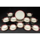 An Aynsley bone china part dinner service, pattern no. 1646, 'Durham', red colourway with gilt