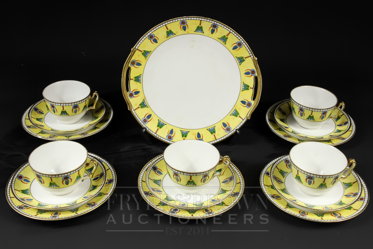 A Noritake Art Deco part tea service, Egyptian pattern of papyrus flowers and other motifs on a