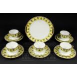 A Noritake Art Deco part tea service, Egyptian pattern of papyrus flowers and other motifs on a
