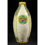 A Boch Freres, Belgium, vase of elongated ovoid from, the cream crackle glaze ground decorated in