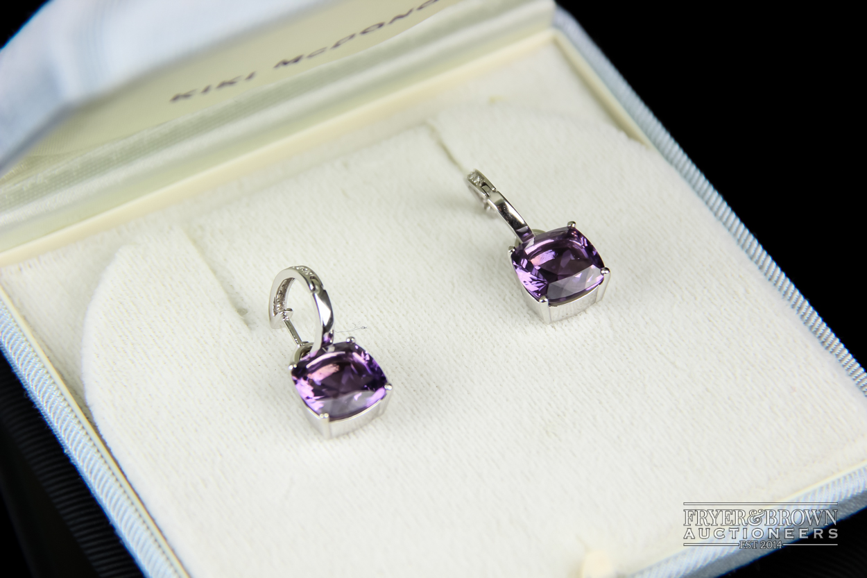 Kiki McDonough An attractive pair of 18 carat white gold and amethyst and diamond earrings, the - Image 2 of 5