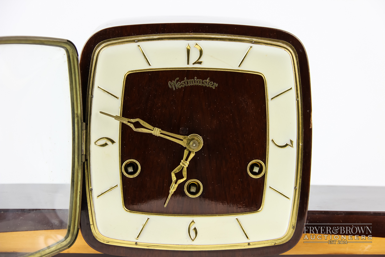 An Art Deco mantle clock , 66 cm long, shelf to either side of square face clock, Westminster - Image 2 of 4