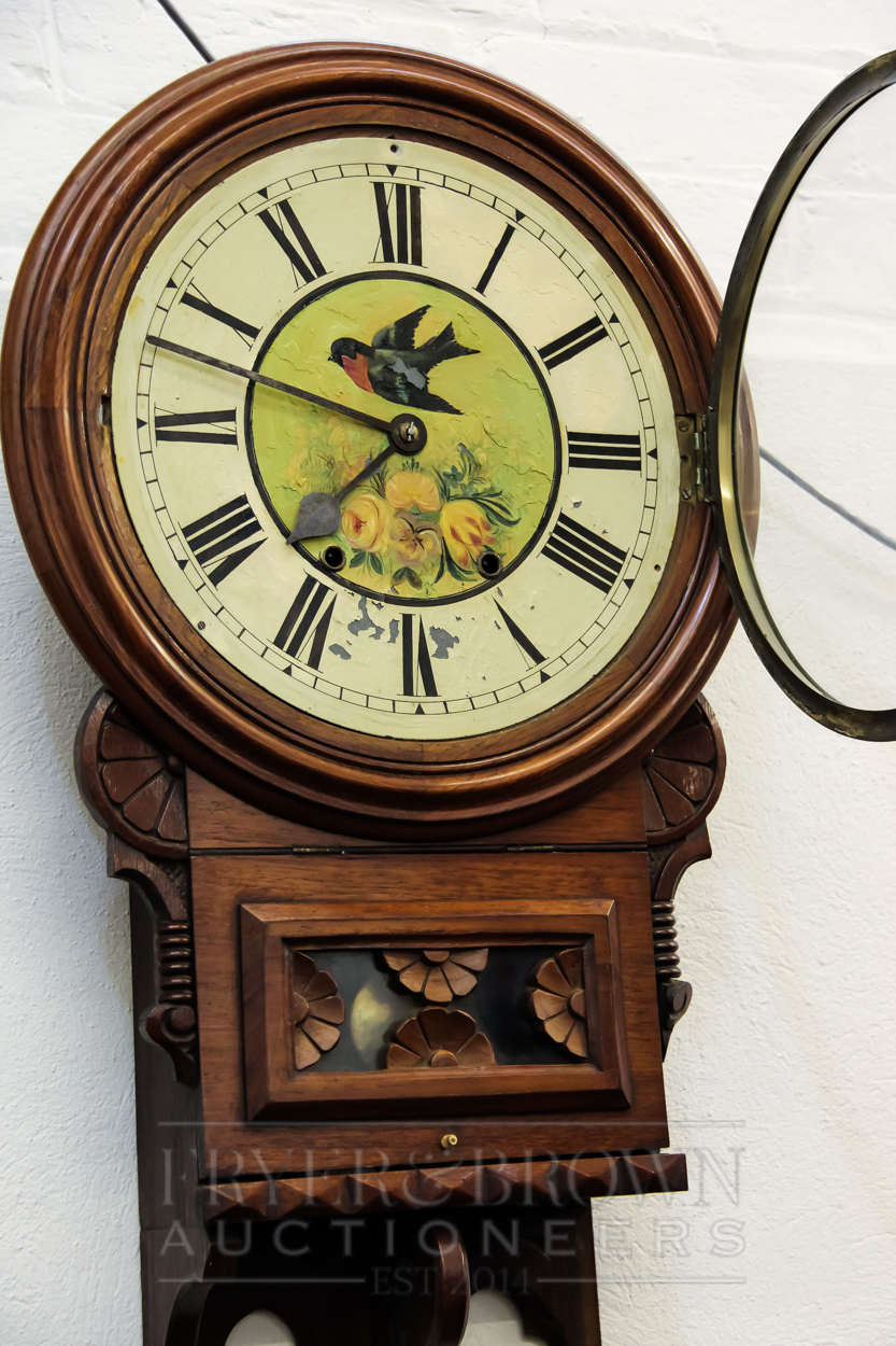 An American walnut wall clock, the circular metal dial painted with a swift and roses above a - Image 4 of 4