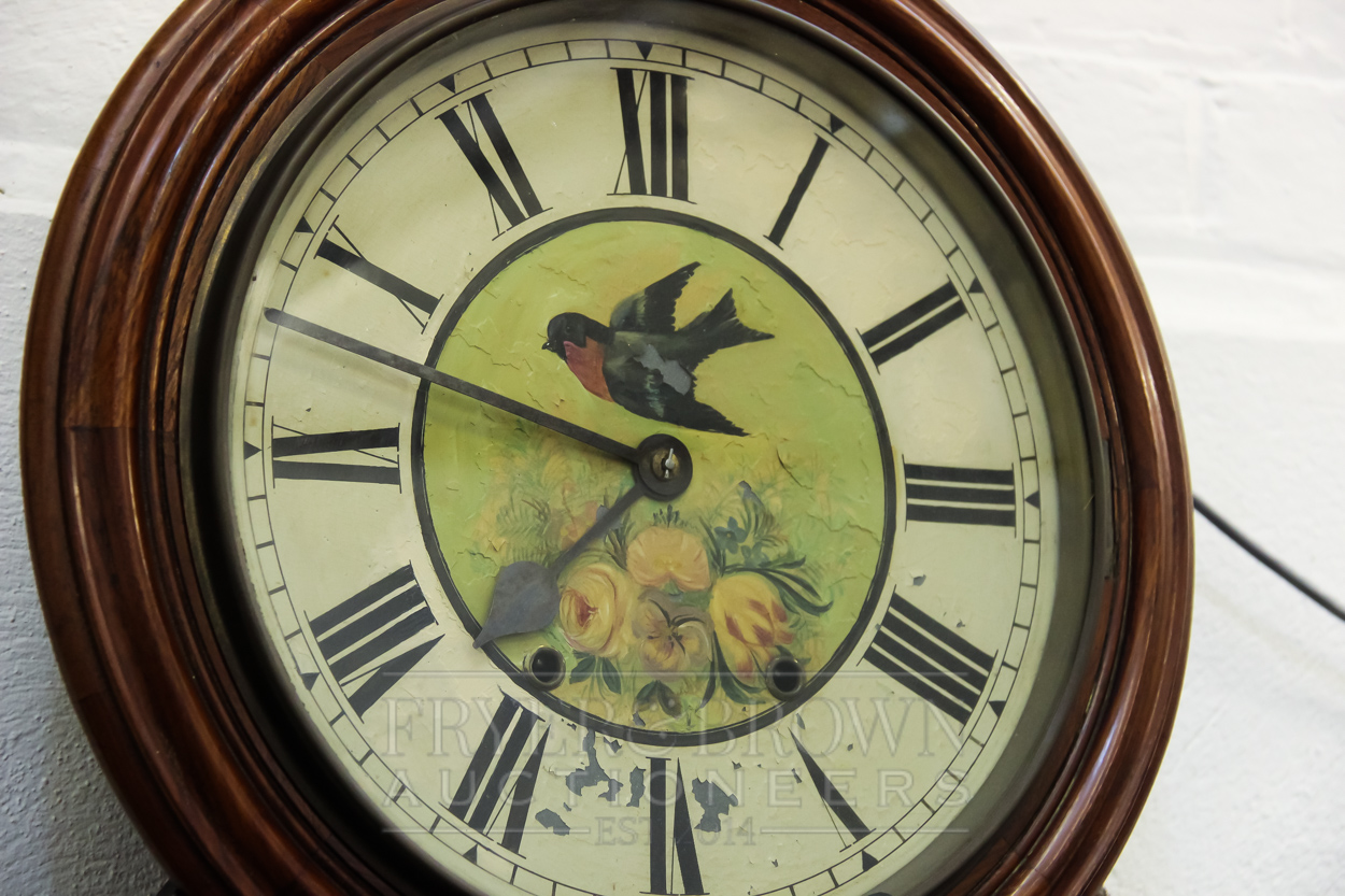 An American walnut wall clock, the circular metal dial painted with a swift and roses above a - Image 2 of 4