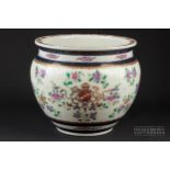 An early 20th century Sampson jardiniere, decorated in polychrome enamels with chrysanthemums and