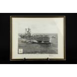 H.M.S. Ark Royal black & white photograph, framed and glazed, signed my Captain A.D. Cassidy, the