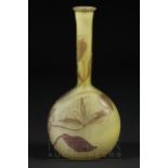 A Galle cameo glass bottle vase, brown through to yellow with lily flowers, signed Galle with