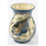 A William Baron, Barnstaple, vase of squat baluster form, decorated with a fish in weeds in