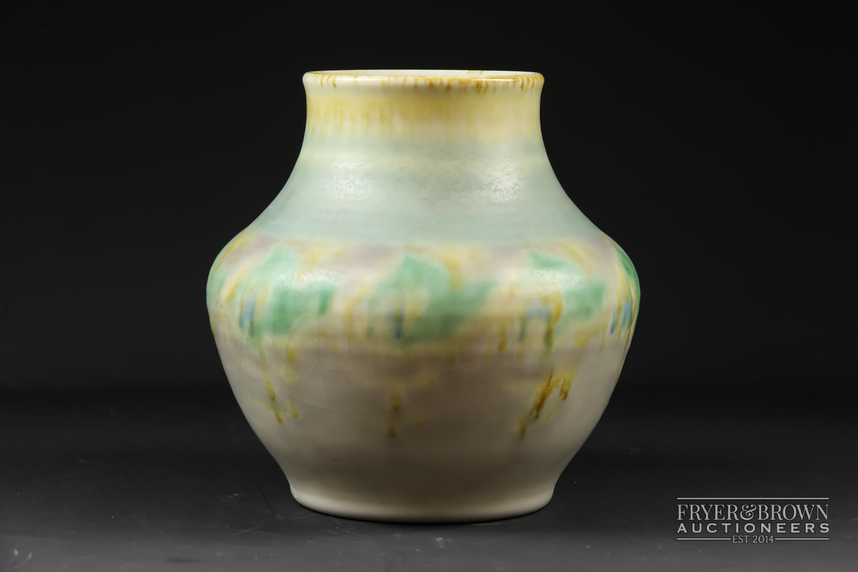 A Pilkingtons Royal Lancastrian vase, decorated in tones of grey, green and yellow drip glaze,