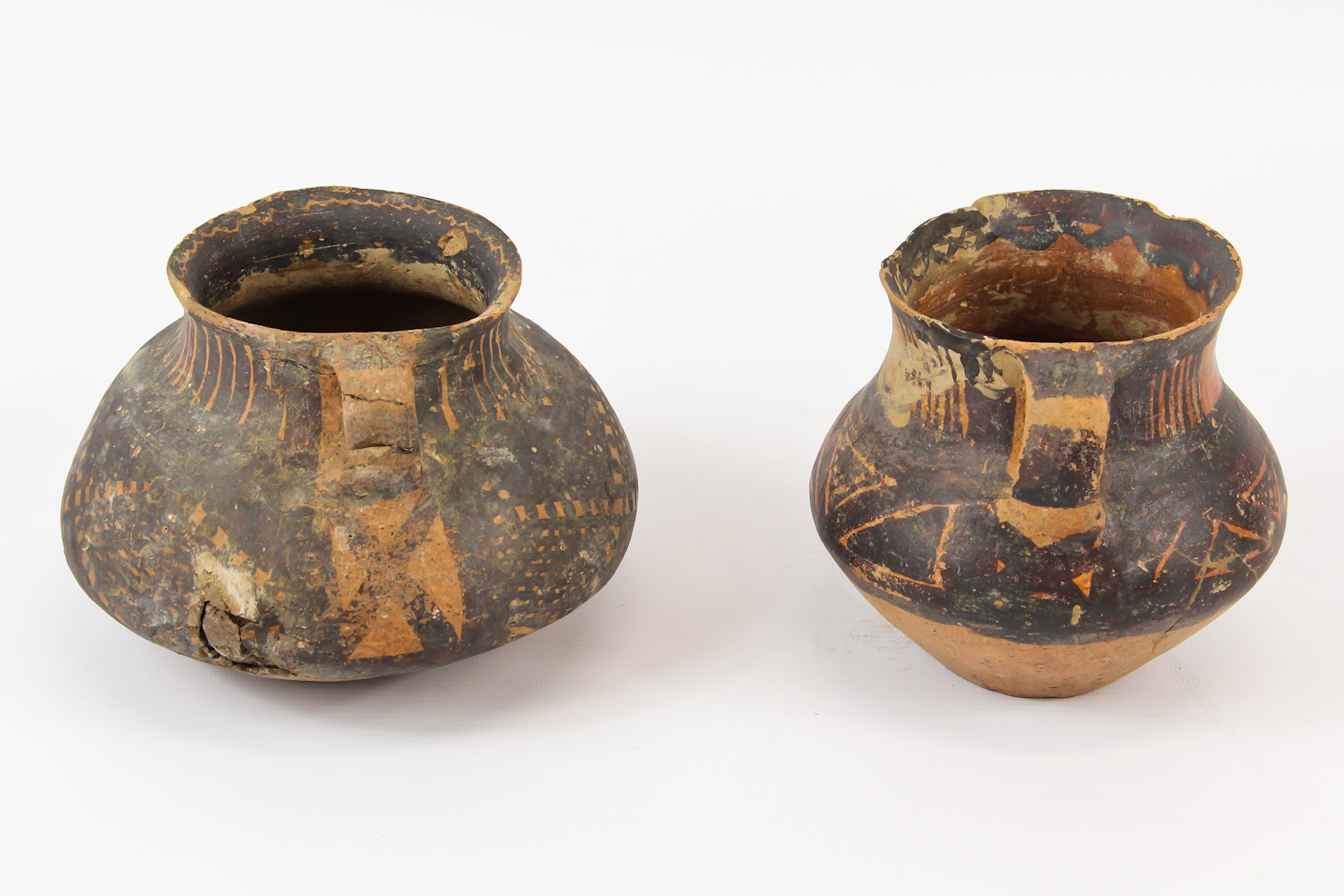 Two Chinese Neolithic redware pottery urns, each of squat globular form, with loop handles to the - Image 2 of 8