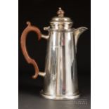 A silver coffee pot with hinged lid, melamine handle and knop, makers mark M & Co., Sheffield