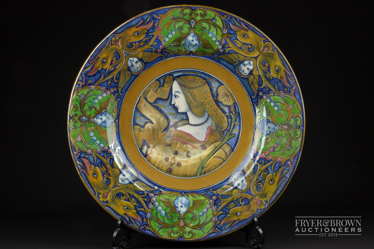 A Cantagalli maiolica charger in Deruta style, decorated with central design of a young lady with