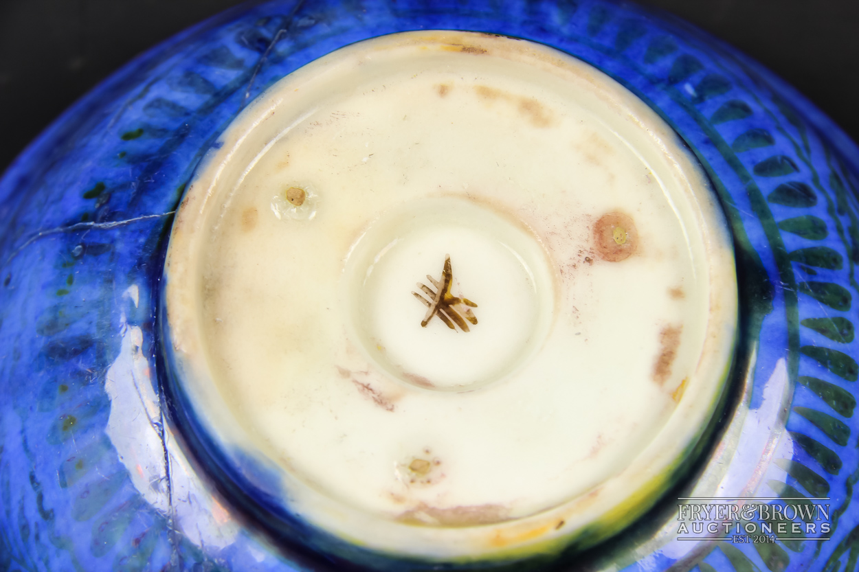 A Safavid lustre pottery bowl, the interior decorated in yellow/ochre with leaves in spandrels, - Image 3 of 4