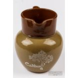 Advertising ware - a Cadbury's drinking chocolate stoneware jug, made by Denby, 14cm high