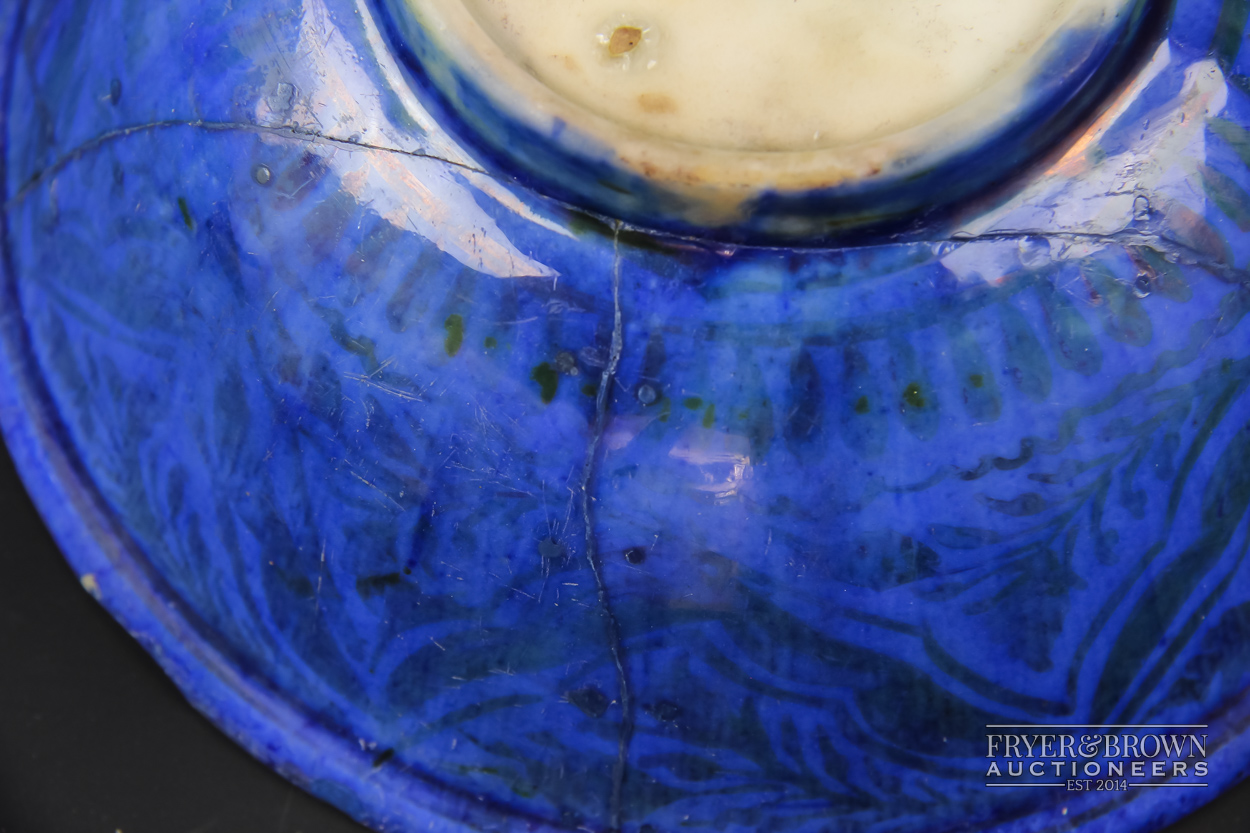 A Safavid lustre pottery bowl, the interior decorated in yellow/ochre with leaves in spandrels, - Image 4 of 4