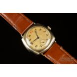 A vintage 9ct gold Longines cushion shaped gentleman's wrist watch, c1930, the Champagne coloured