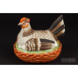 A Staffordshire pottery chicken on nest egg box/or butter tub, of unusually small size, 13.5cm high