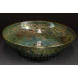 A large Pilkingtons Royal Lancastrian lustre bowl, decorated by Richard Joyce with fish in