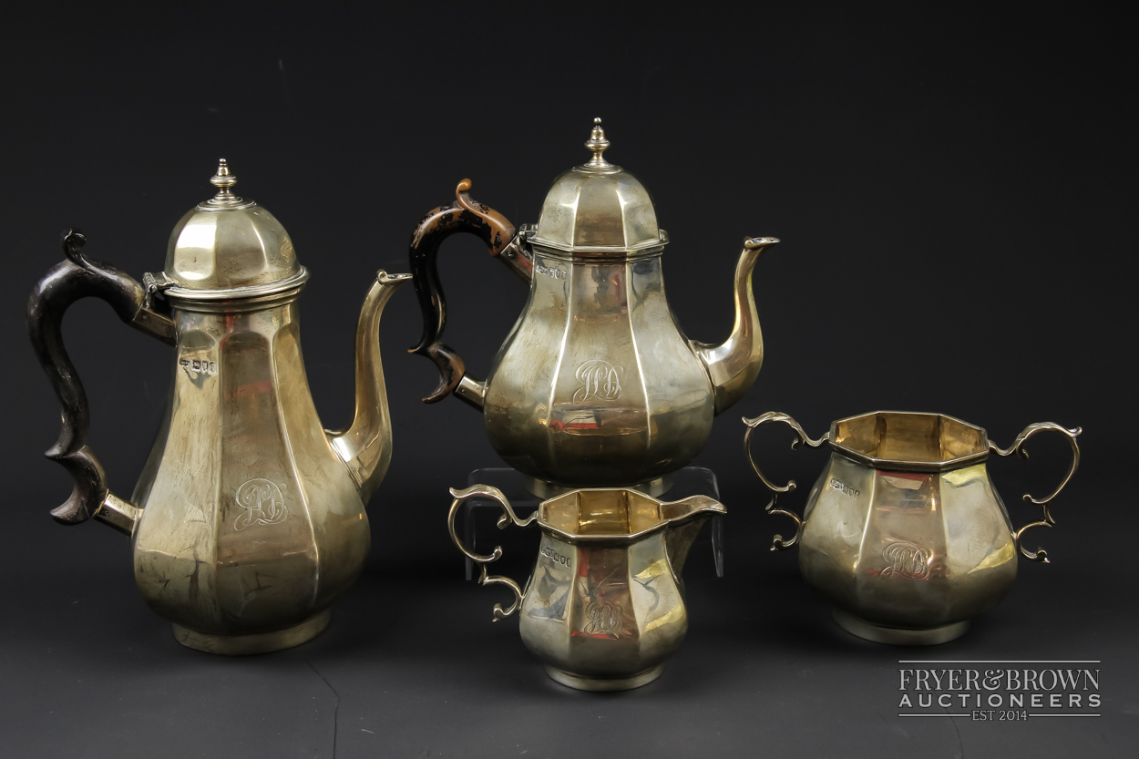 An Elkington & Co. silver tea service comprising coffee pot, teapot, milk and sugar bowl, London