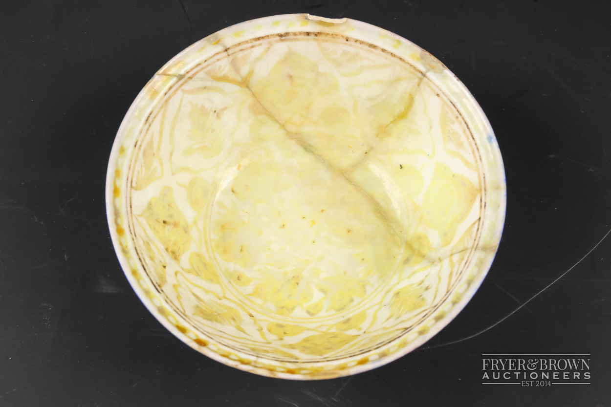 A Safavid lustre pottery bowl, the interior decorated in yellow/ochre with leaves in spandrels, - Image 2 of 4