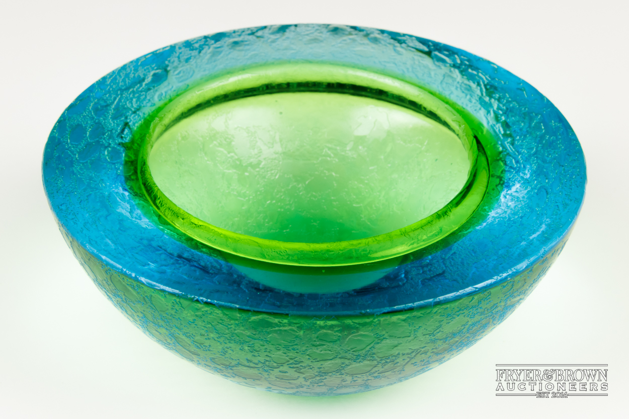 A Cenedese style glass geode bowl, in electric blue and Uranium green, unusual textured exterior,