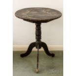 A black japanned circular side table with chinoiserie decoration of waterfowl and irises, 57cm