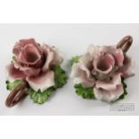 A pair of ceramic candle holders in the form of pink roses (2)