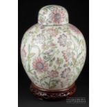 A modern decorative large ginger jar & cover in the Chinese style, decorated all over with flowering