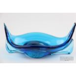 A Mdina blue glass gondola form dish, etched mark to base, 18cm approx.