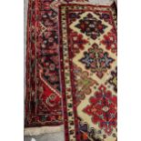 Two Persian runners, 107 x 73cm and 99.5 x 30.5cm (2)