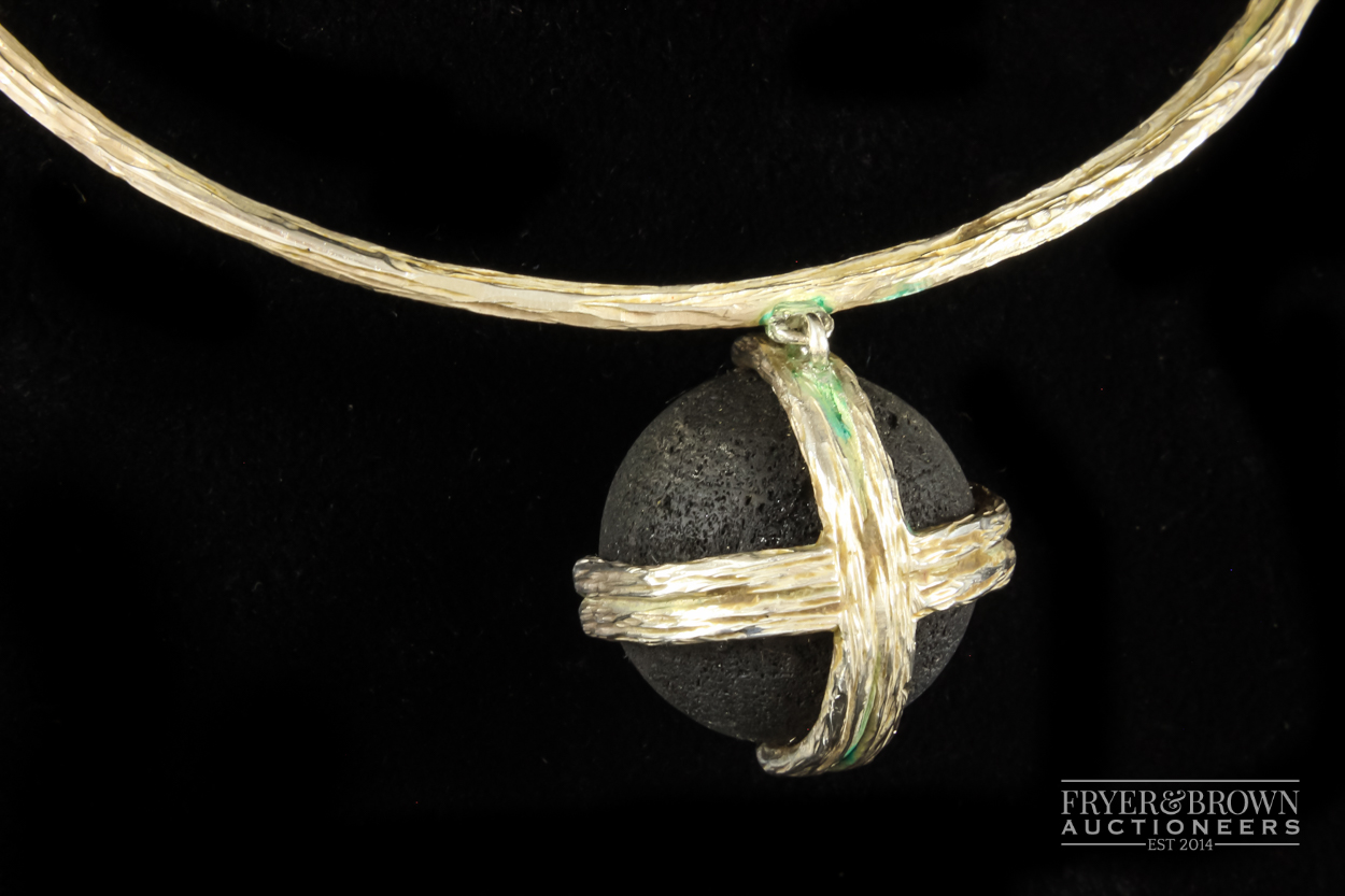 An Icelandic designed and made silver and volcanic rock necklace, bangle and ring, the textured - Image 2 of 6