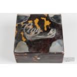 A silver mounted tortoiseshell cigarette box, of square section, the cover with silver script and