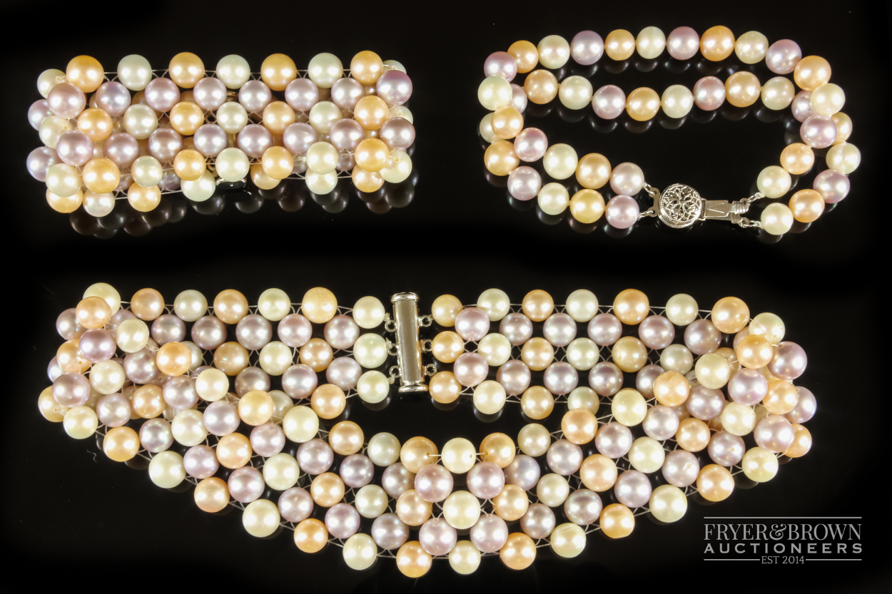 A fancy coloured pearl choker necklace and bracelet, the wide band strung with pale lilac, apricot