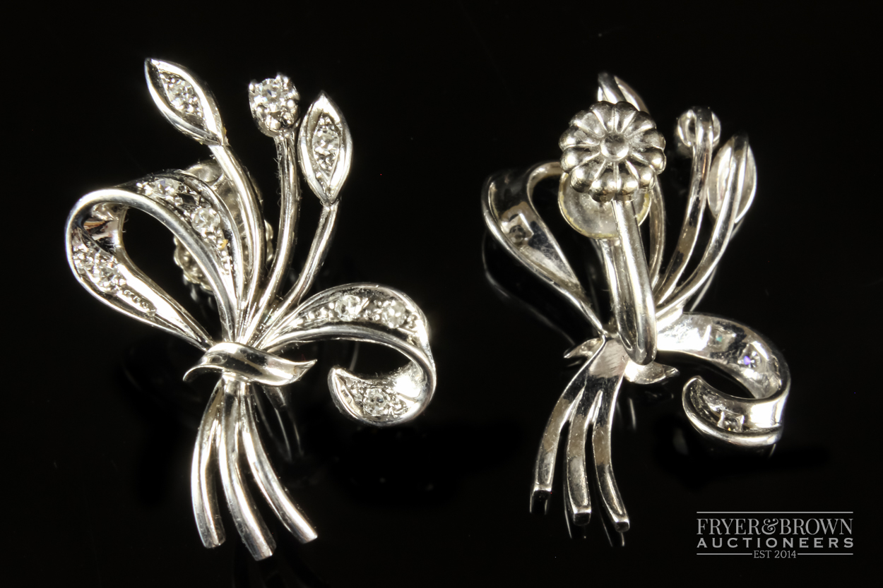 A 1950s diamond and white gold spray brooch/pendant, the bouquet scroll set throughout with - Image 7 of 7