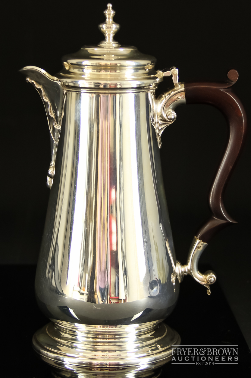 A silver hot water jug, makers mark CJ Vander Ltd, London 1973, 636grs