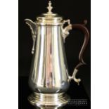 A silver hot water jug, makers mark CJ Vander Ltd, London 1973, 636grs
