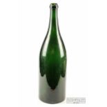 A large green glass bottle, probably 19th century, 48cm approx.